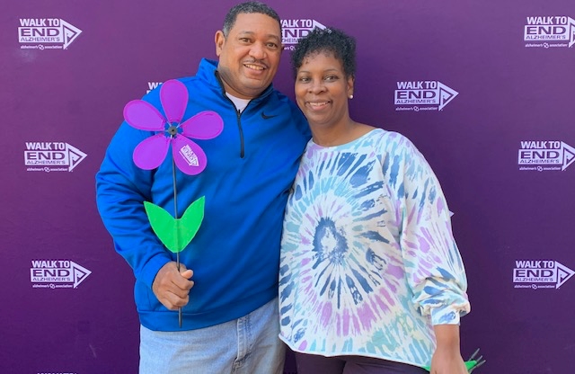 Portrait of two volunteers from The Cedars participating in a Walk to End Alzheimer's event, demonstrating the benefits of volunteering