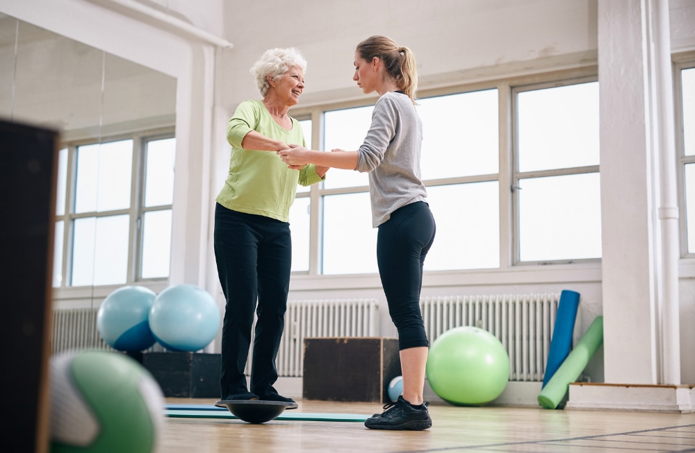 Senior woman practicing balance exercises for fall prevention